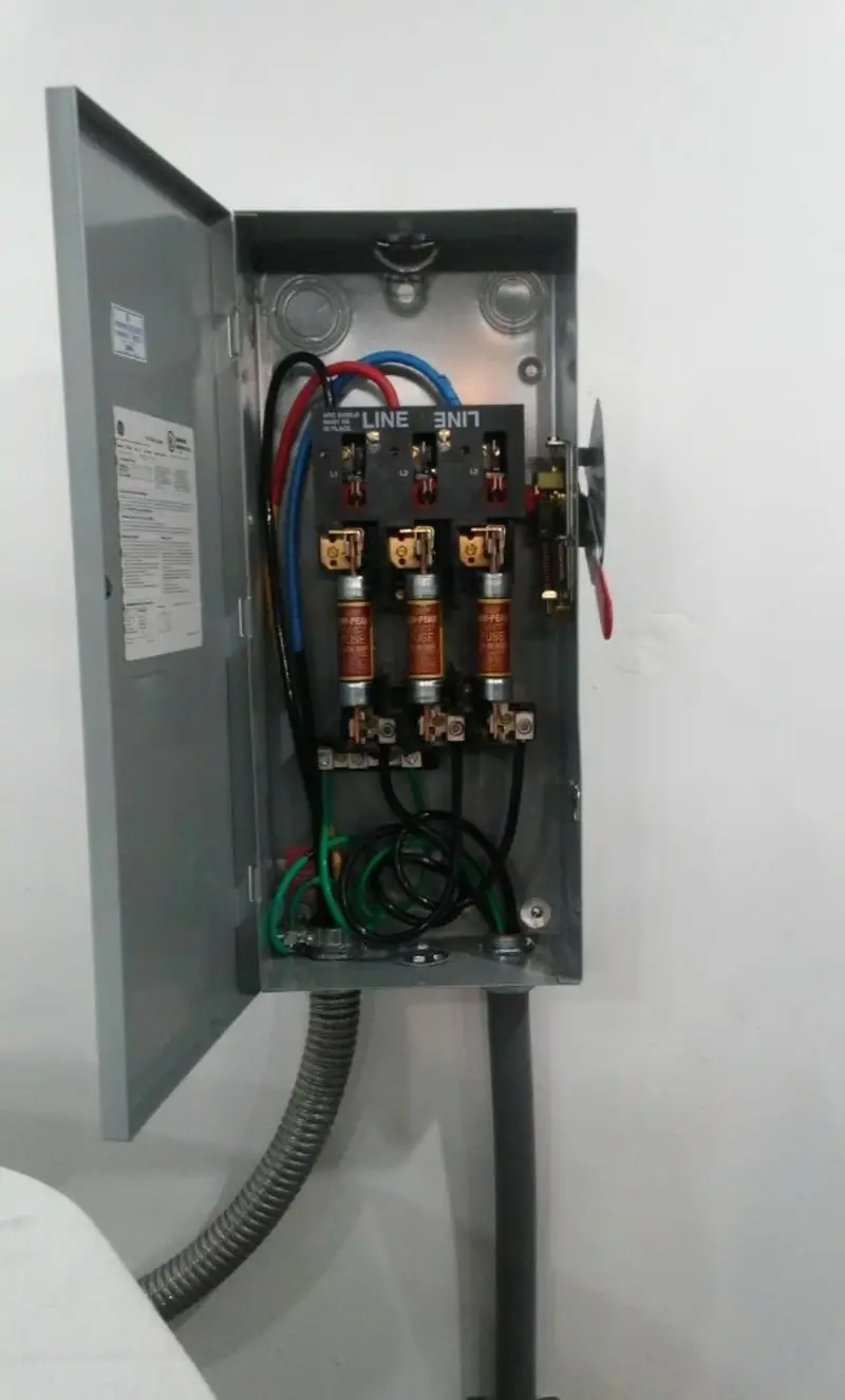 Three-phase disconnect switch installed for Smoke Detector Installation in Fort McKinley